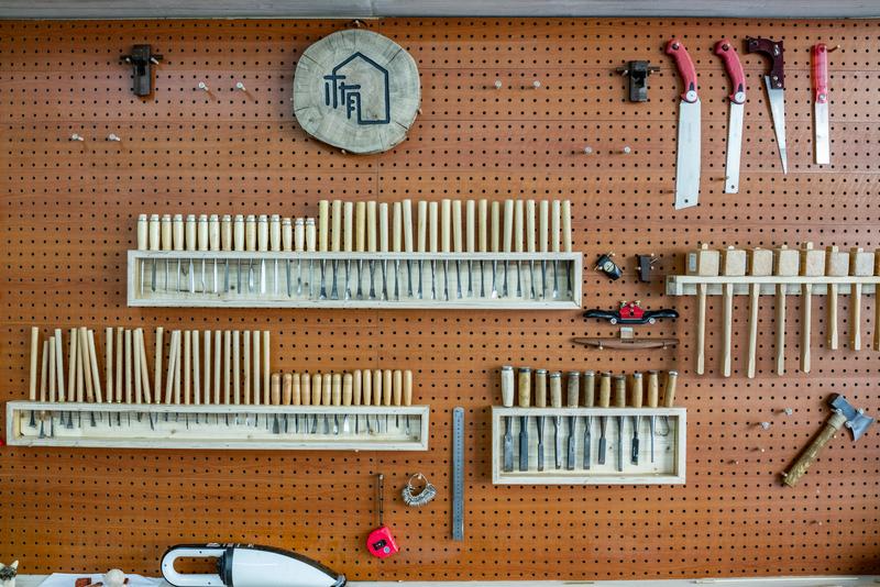 Hardware tools are hung on the wall for consumers to purchase conveniently